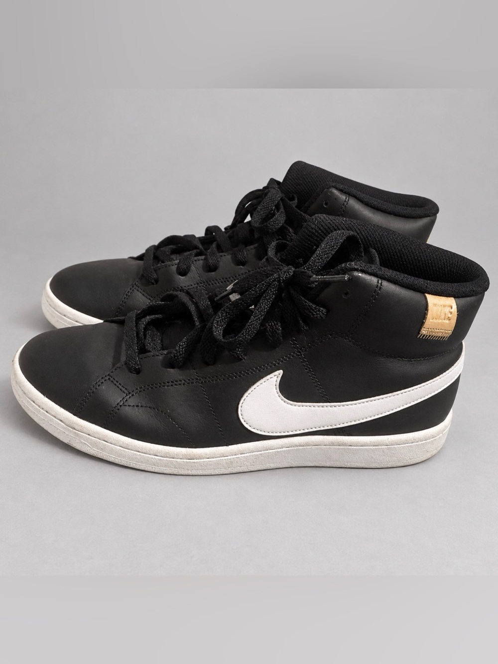 Nike Men’s 10.5 Black High-Top Sneakers with White Swoosh